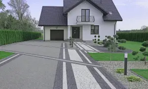 Nowoczesny podjazd do domu z geometrycznymi wzorami z kostki brukowej, prowadzący do białego domu z garażem i zadbanym ogrodem.