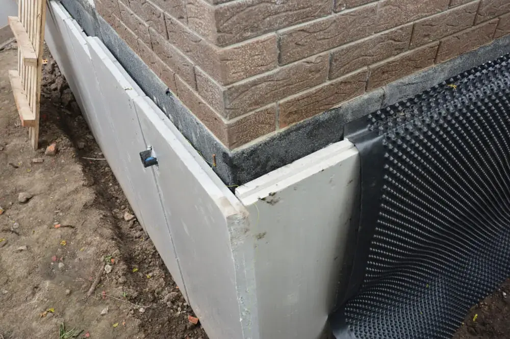 Czym ocieplić fundament w domu: skuteczne materiały i sposoby izolacji